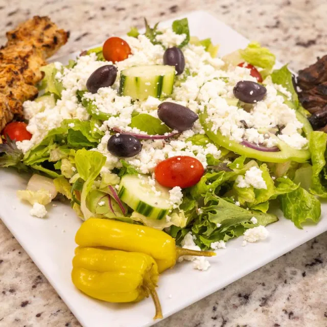 Greek salad with feta, olives and pepperoncini